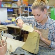 Woman sculpting clay Art Classes in Rocky Mount